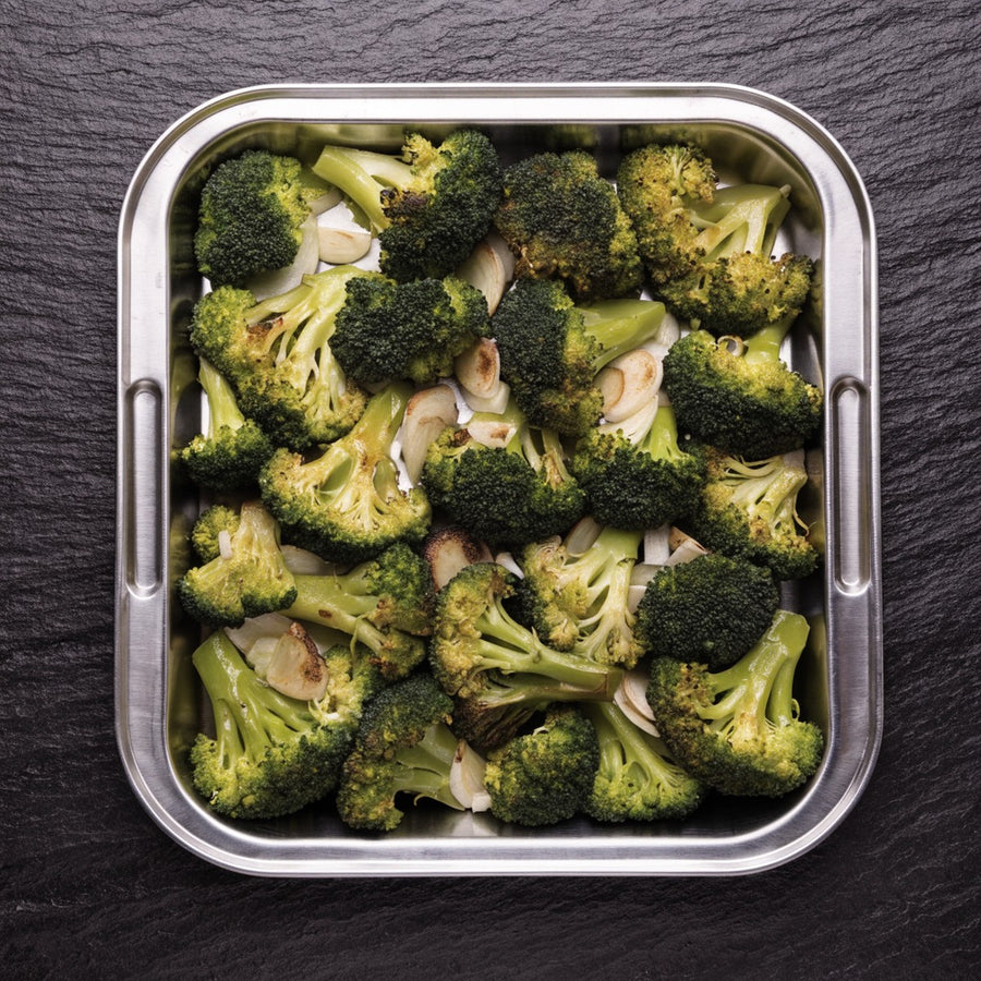 Tray of roasted garlic and broccoli