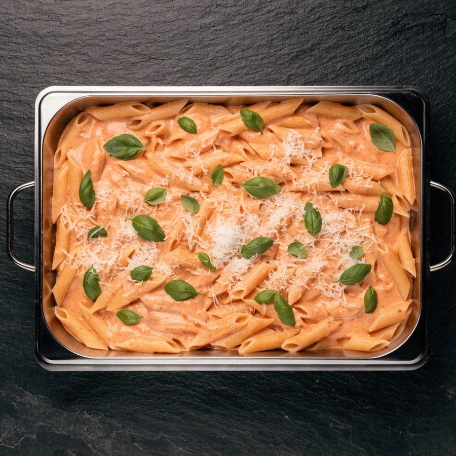 Tray of penne in pink vodka sauce